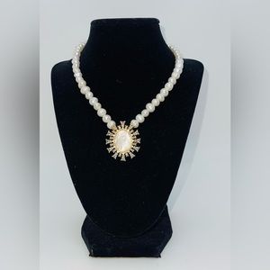 YELLOW GOLD PLATED MOTHER OF PEARL NECKLACE WITH A RELIGIOUS PENDANT 18”